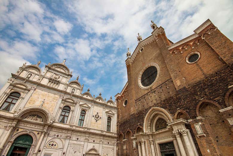 Marvel at the facade of the Basilica dei Santi Giovanni e Paolo